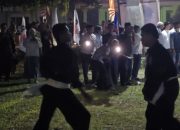 Anwar Hafid dan Reny Lamadjido Disambut Seni Bela Diri saat Sambangi Kecamatan Bolano Lambunu Parimo