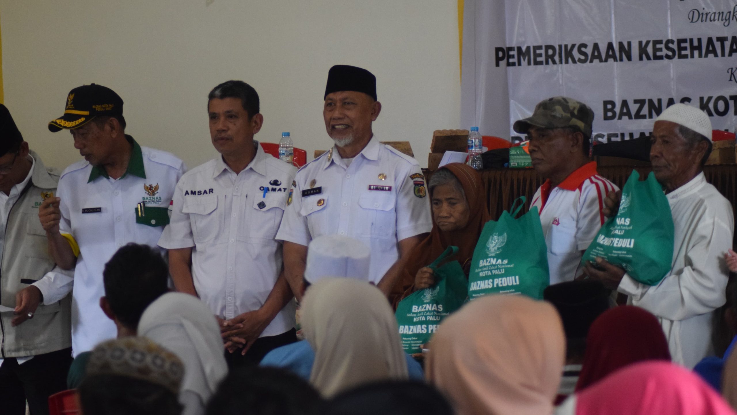Baznas Kota Palu Salurkan Bantuan Uang Tunai dan Sembako untuk 306 Penerima Manfaat
