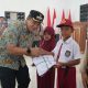 Pemkab Morowali Salurkan Ratusan Seragam Sekolah Gratis untuk Siswa di Menui Kepulauan